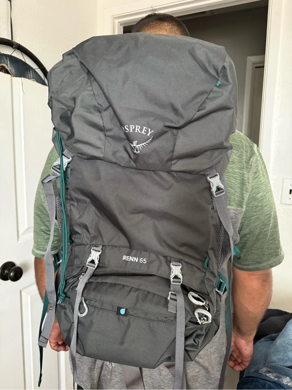 OSPREY Renn 65 Backpack in Charcoal with Teal Accents